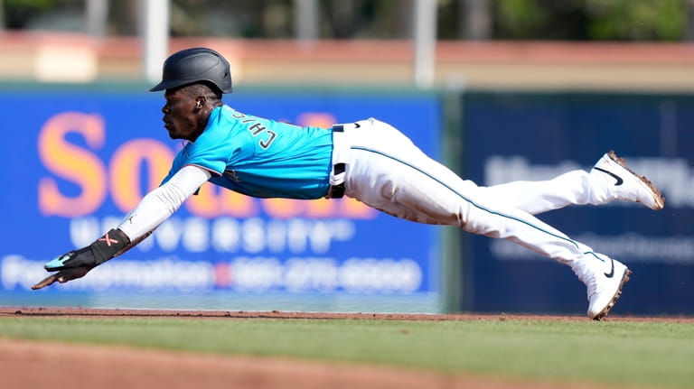 Miami Marlins' Jazz Chisholm Jr. steal second base during the...