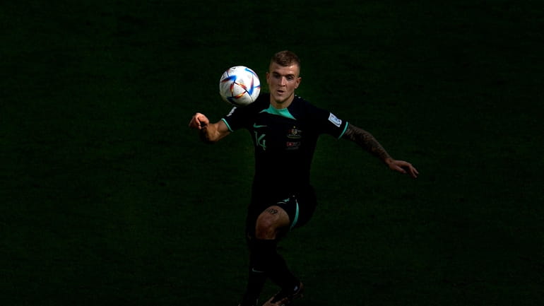 Australia's Riley McGree eyes the ball during the World Cup...
