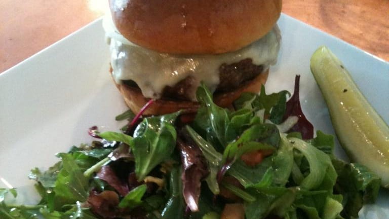 Burger with salad at Outeast Cafe, Southampton
