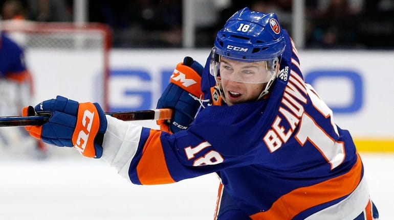Anthony Beauvillier of the Islanders shoots the puck during the first...