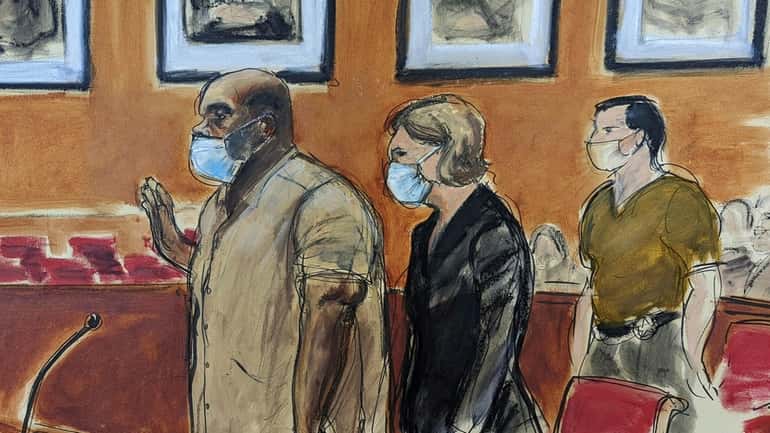 In this courtroom sketch, Frank James, left, the man accused...