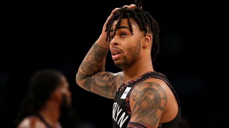 D'Angelo Russell #1 of the Brooklyn Nets reacts during the...