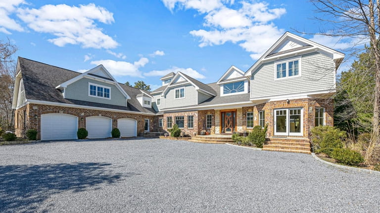 The seller of this 9,200-square-foot house in Hampton Bays is offering...