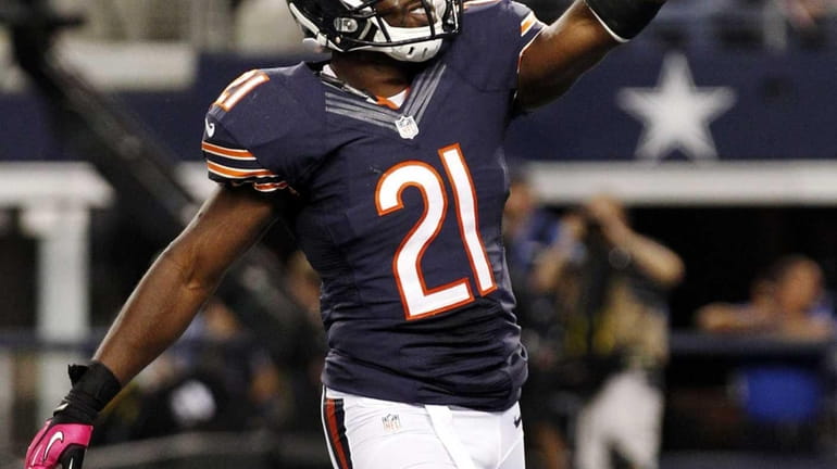 Chicago Bears strong safety Major Wright celebrates his interception against...