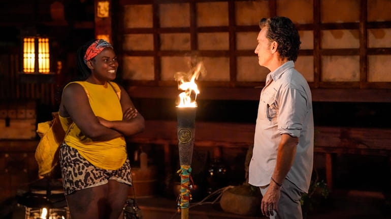 "Soda" Thompson and "Survivor" host Jeff Probst at Tribal Council on...