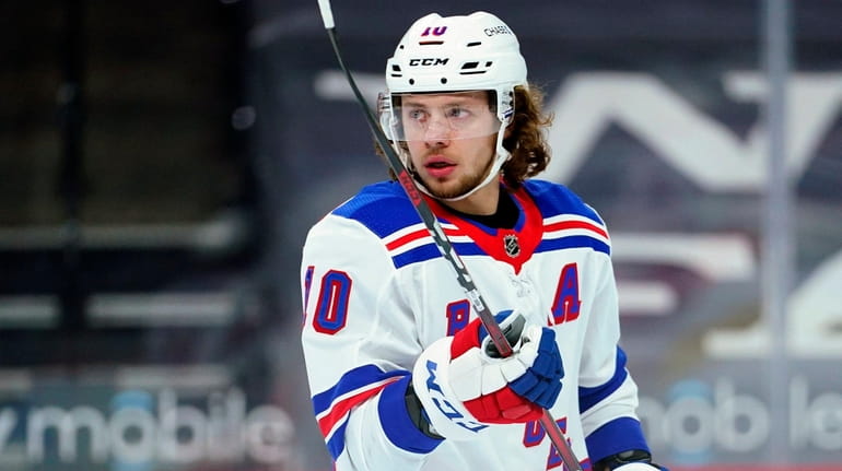 The Rangers' Artemi Panarin plays during an NHL game against...