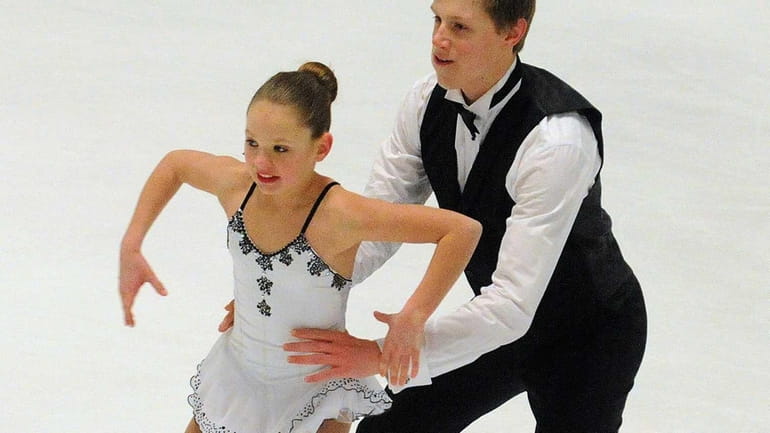 Figure skating pair Darbie Burke, 12, and Griffin Schwab, 16,...