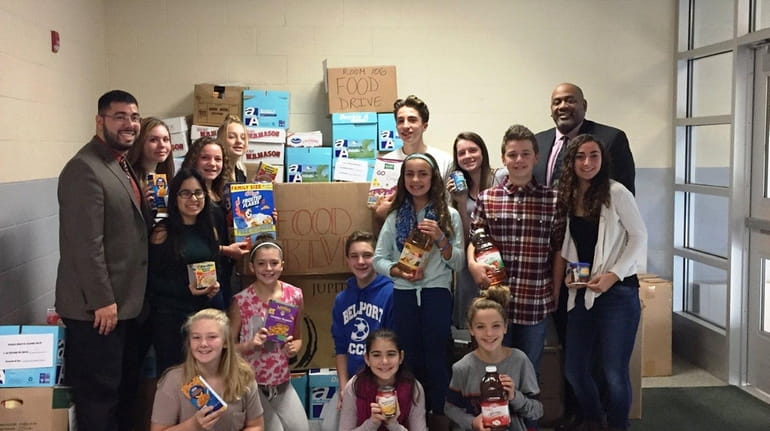 Bellport Middle School students collected 3,397 food items in a...