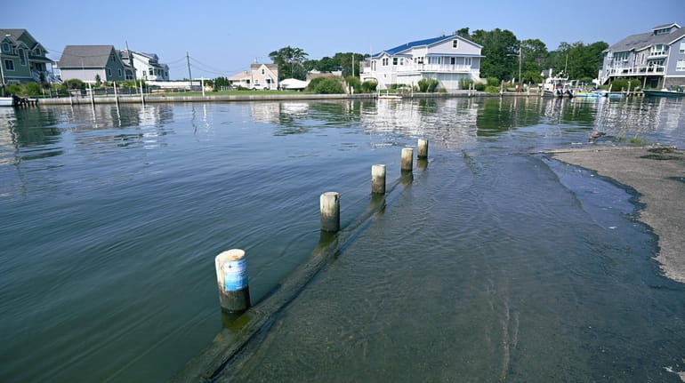 The waters of Moriches Bay near some homes in Moriches on...
