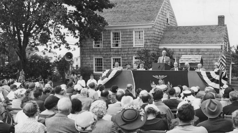 Albert Corey of Albany speaks to a crowd assembled for...