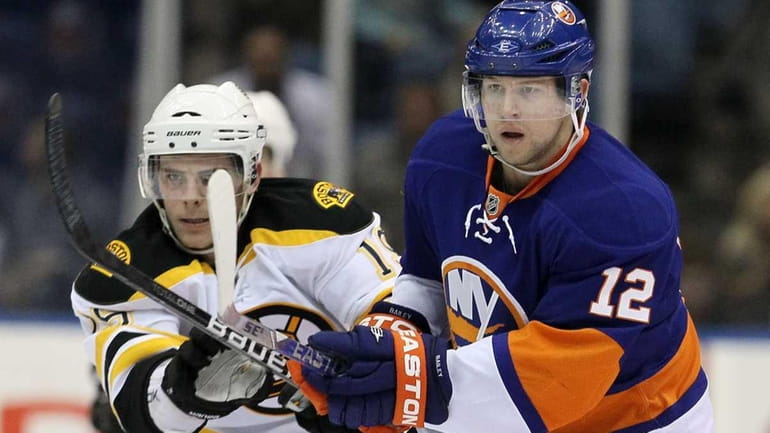 Josh Bailey #12 of the New York Islanders skates against...