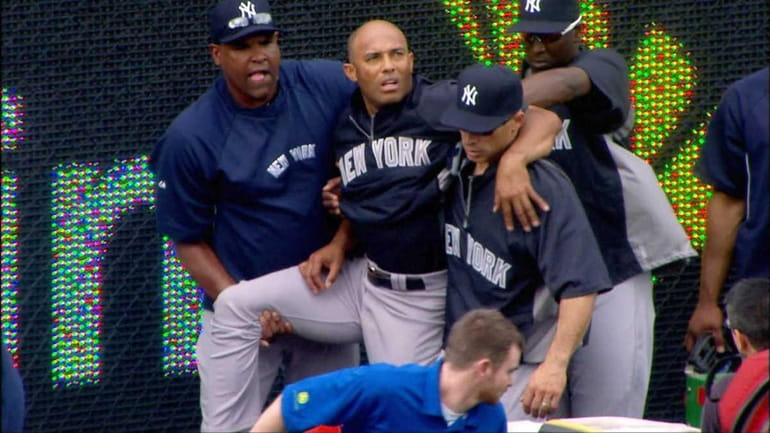 In this image taken from video, Yankees manager Joe Girardi,...
