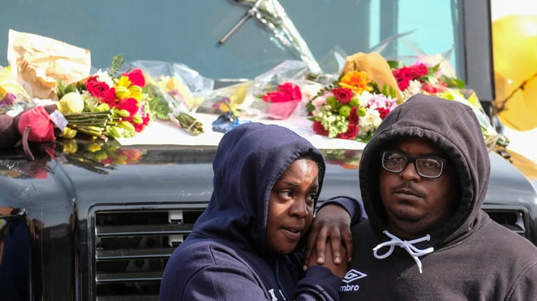 Fans of rapper Nipsey Hussle mourn his death at a...