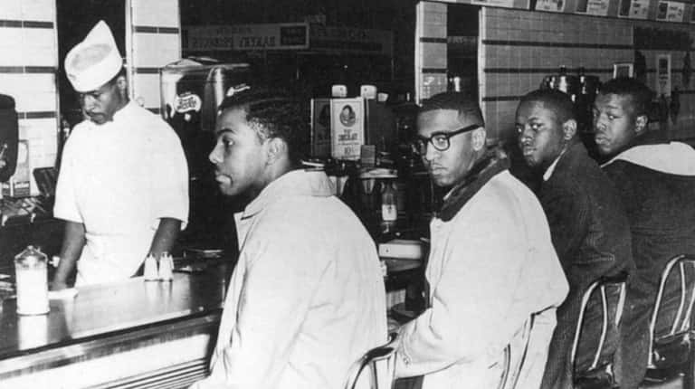 Students Joseph McNeil, from left, Franklin McCain, Billy Smith, and...
