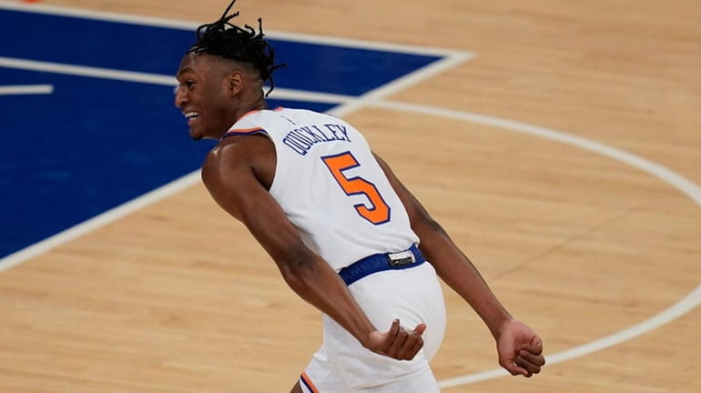 The Knicks' Immanuel Quickley celebrates a three-point basket during the...