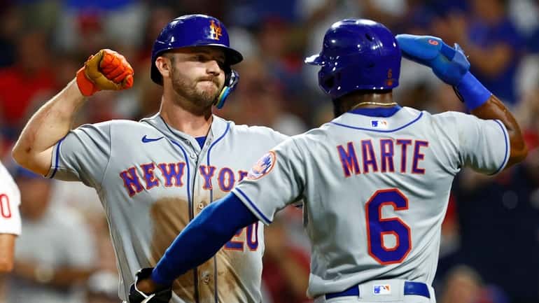 Pete Alonso of the Mets celebrates his two-run home run...