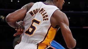 Los Angeles Lakers forward Metta World Peace gives an elbow...