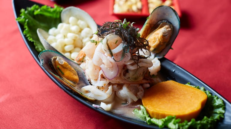 Ceviche mixto with shrimp, sea bass, mussels and calamari in lemon...