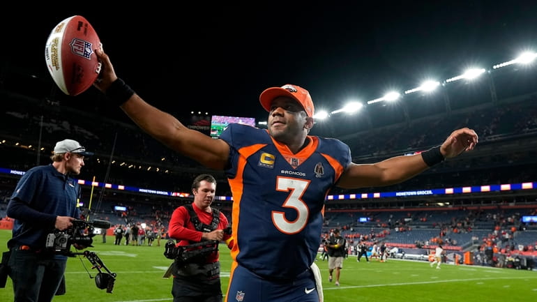 Denver Broncos quarterback Russell Wilson (3) celebrates after the Broncos...