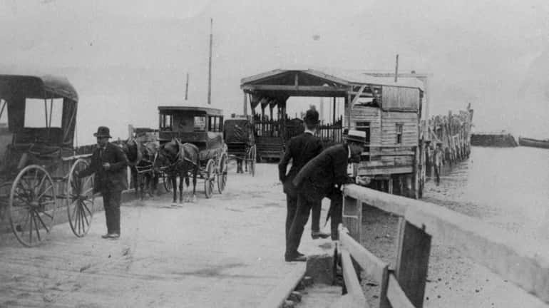 Carriages await passengers who would be arriving from Manhattan via...