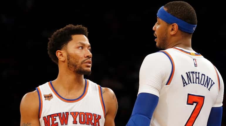 Derrick Rose #25 and Carmelo Anthony #7 of the New...
