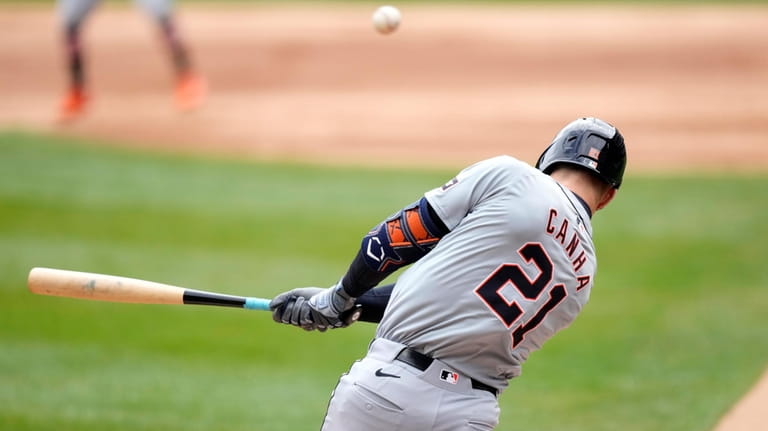 Detroit Tigers' Mark Canha hits a two-run single off Chicago...