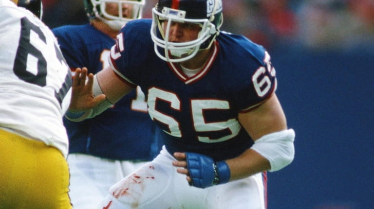 Giants center Bart Oates (65) pass blocks during the NFL...