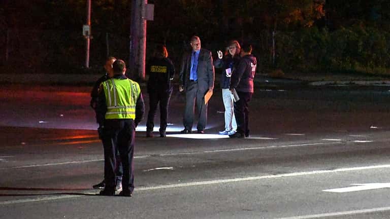 Suffolk County police at the scene of a fatal pedestrian hit-and-run...