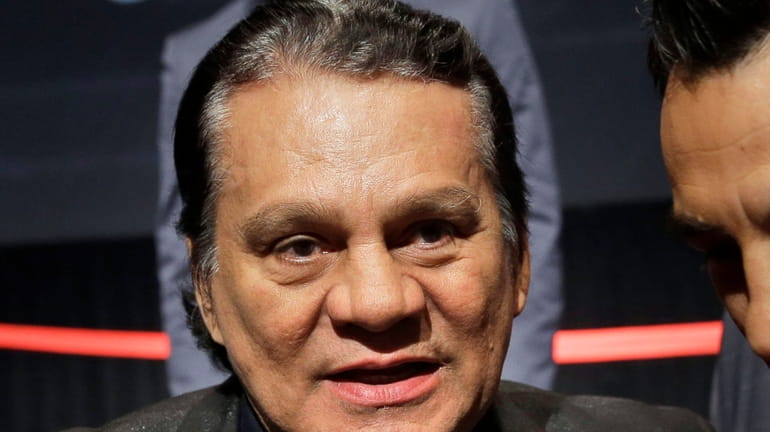 Boxing great Roberto Duran attends a news conference in New...