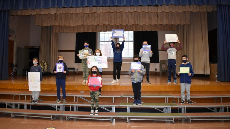 In Northport, Ocean Avenue Elementary School students created posters with...