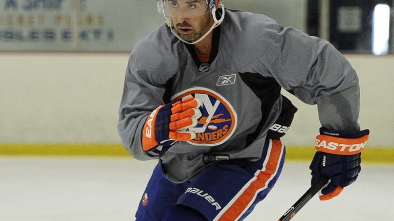 Islanders right wing Cal Clutterbuck skates during training camp at...