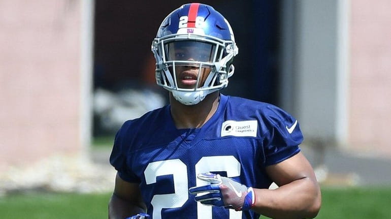 Giants running back Saquon Barkley participates in OTAs on May...