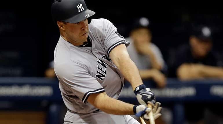 New York Yankees' Mark Teixeira breaks his bat as he...
