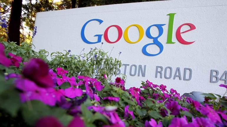 The Google logo is displayed outside Google's headquarters in Mountain...
