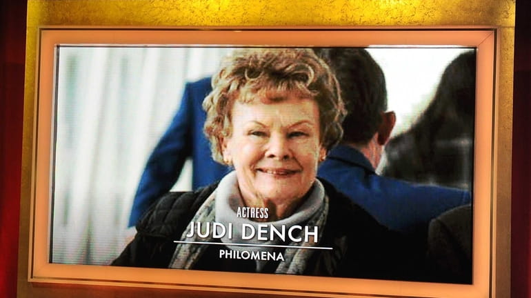 An image of best actress nominee Judi Dench is displayed...