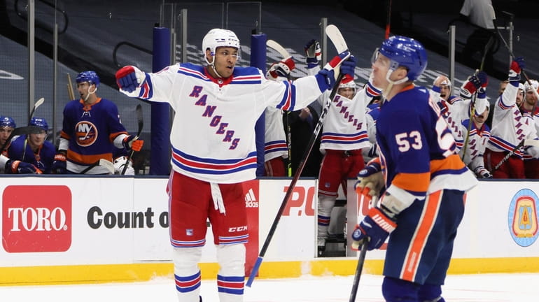 K'Andre Miller #79 of the Rangers celebrates his third period goal...