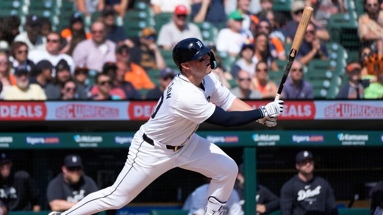 Detroit Tigers' Spencer Torkelson hits a one-run single against the...