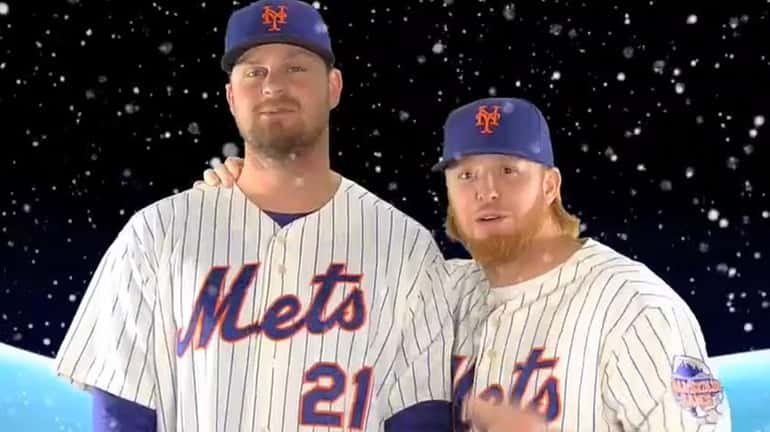 A screenshot from a Mets.com holiday video featuring Lucas Duda,...