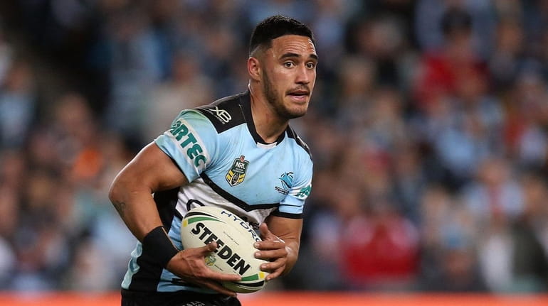 Valentine Holmes of the Sharks runs with the ball during...