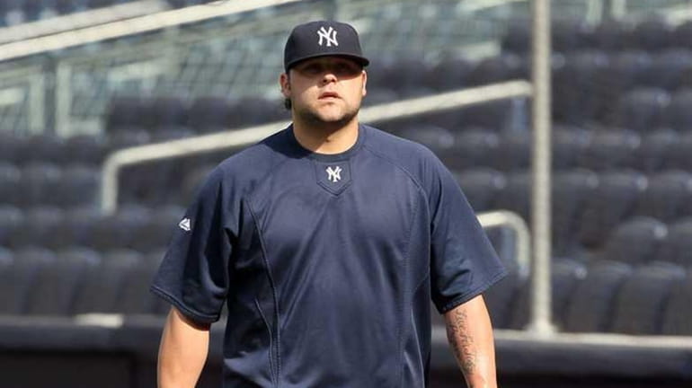 Yankees reliever Joba Chamberlain during warmups prior to facing the...