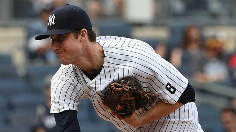 New York Yankees relief pitcher Bryan Mitchell delivers a pitch...