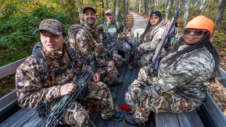 Hunters of Color members, clockwise from left: Frederick Tran, 23,...