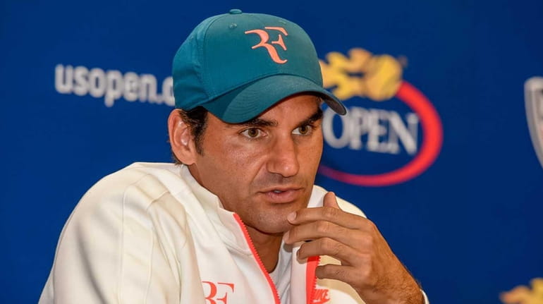 Roger Federer speaks to the media at the USTA Billie...