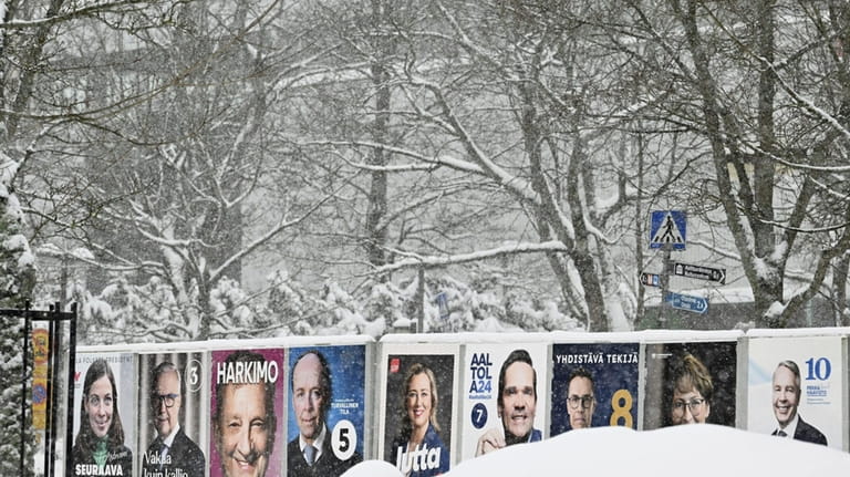 Election posters pictured ahead of the Finnish presidential election in...