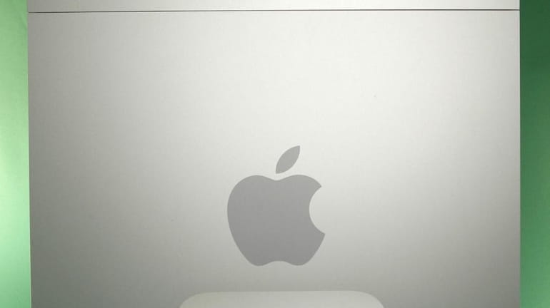 Apple's new $699 Mac Mini, it's smallest and cheapest computer...