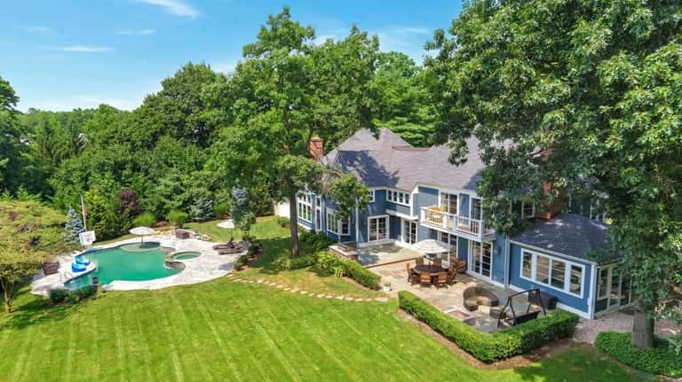 This six-bedroom home on almost 1.8 acres in Locust Valley...