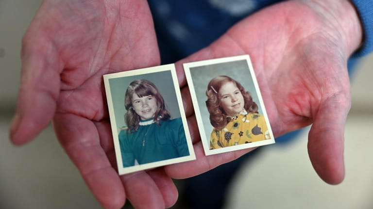 Kathleen Ryan holds photos of herself at around the age...