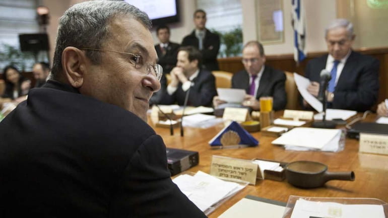 Israeli Defense Minister Ehud Barak, front left, and Israeli Prime...