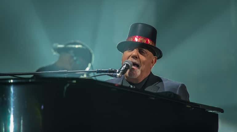 Billy Joel performs late Monday during his New Year's Eve...