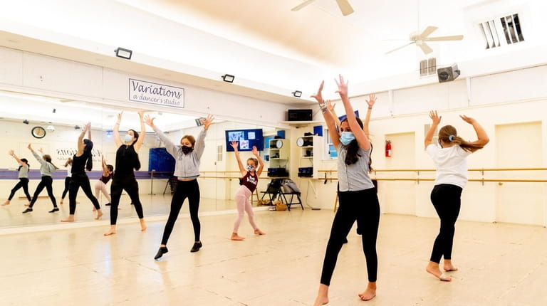 Students take jazz lessons at Variations, a dancer's studio in...